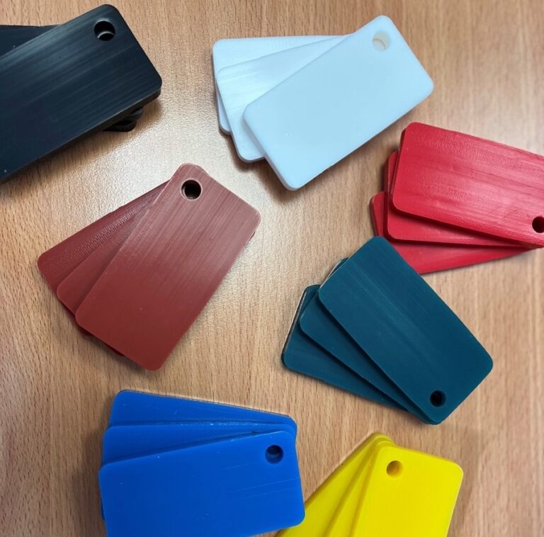 Slabs of colourful punched pieces of silicone rubber